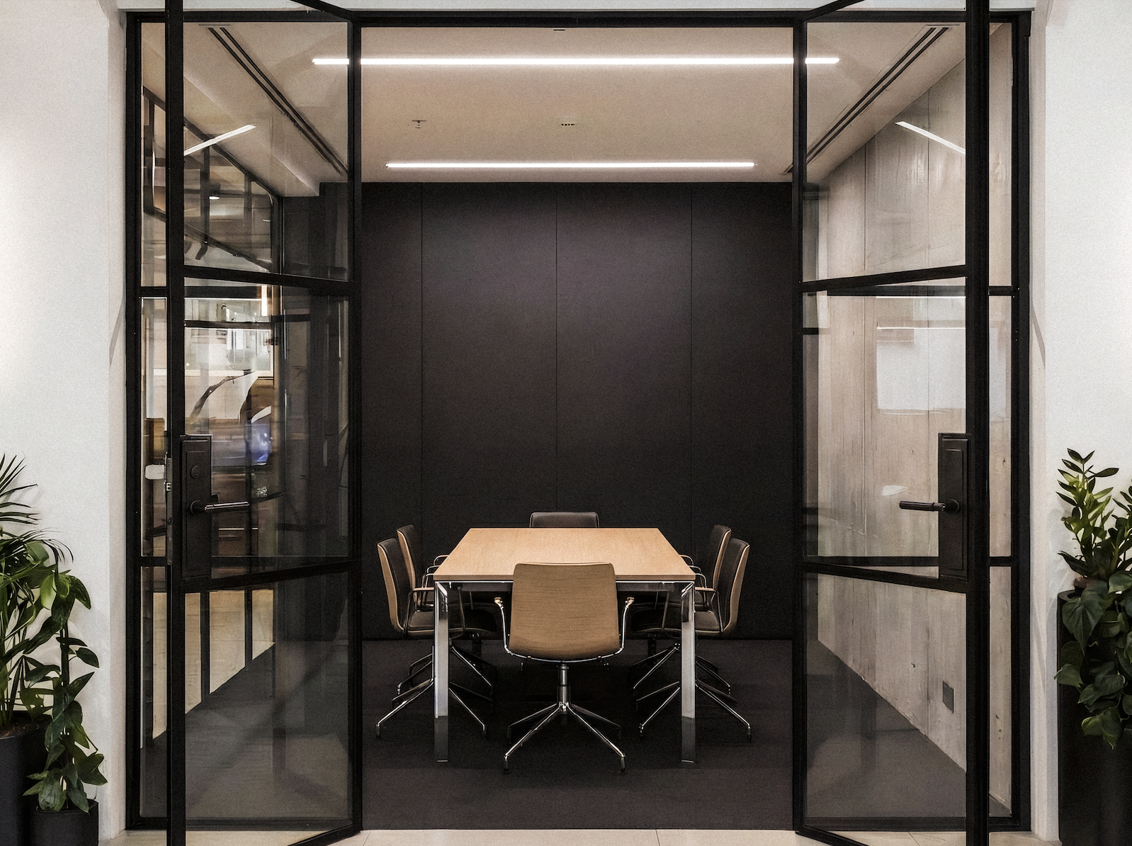 Ignition Series fire-rated glass doors in a modern conference room